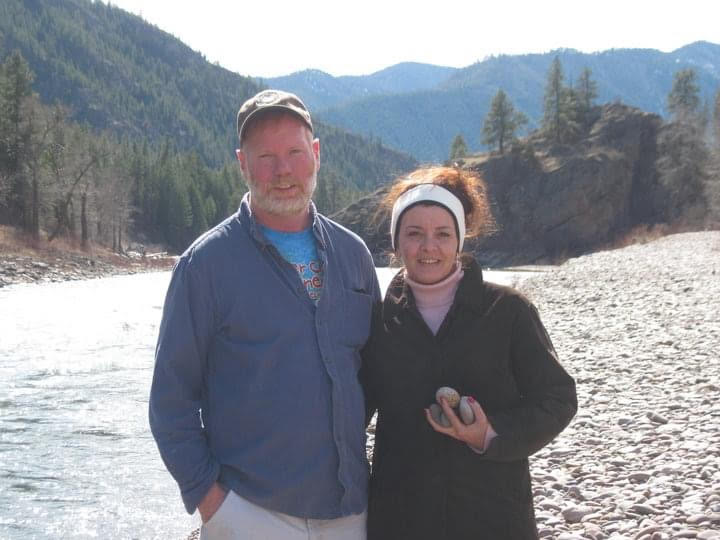 Steve McMahon with companion at an outdoor gathering